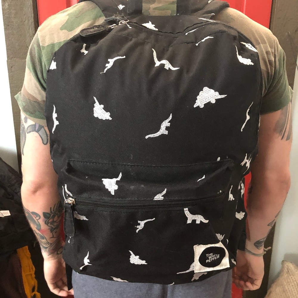 White Pepper dinosaur backpack